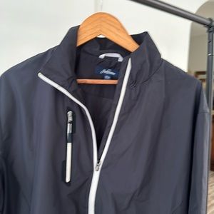 Jack Nicklaus golf jacket. Lightweight rain resistance. Blue with white.